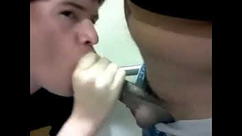 Play Twink sucking cock in public restroom