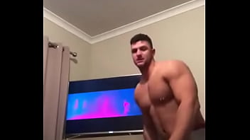 Play Sexy muscle guy strips for the camera