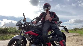Play Wanking and cumming on my bike in full leathers and helmet